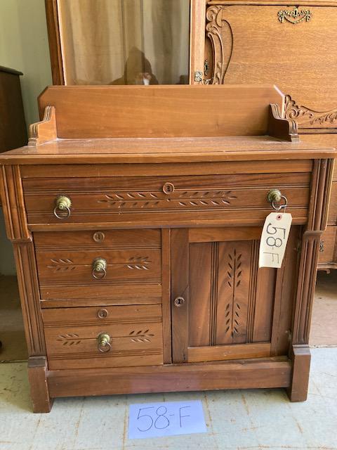 1890s Solid Walnut Refinished Commode: 1890s solid walnut three drawer one door refinished commode. Commode with butter mold carving and backsplash. 30"w x 16.5"d x 32.5"h. Please read the Terms and Conditions of this auction thoroughly fo