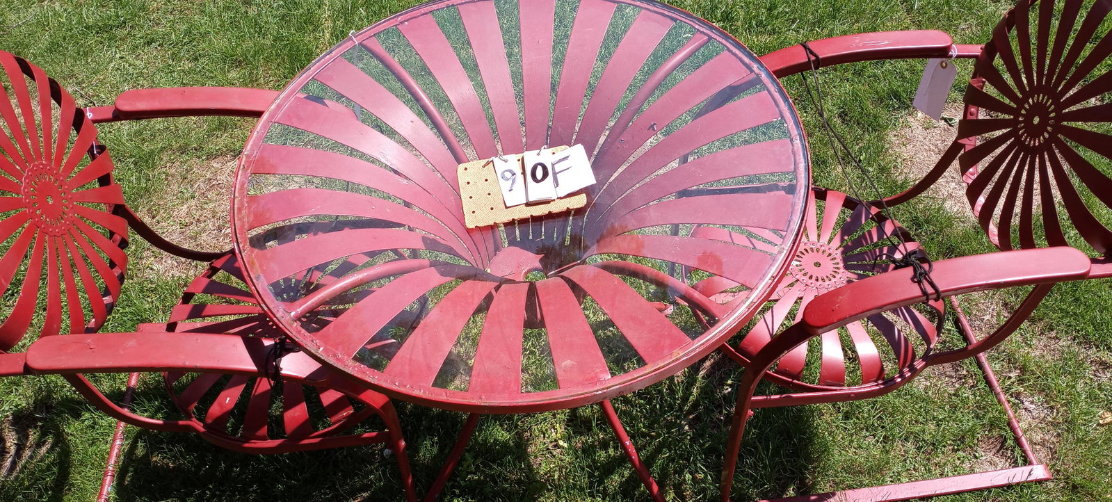 1860s French Spring Three Piece Strap Iron Outdoor Set: 1860s French spring three-piece strap iron outdoor set. This comes with the scarce table that is very hard to find and a fitted glass top. There is a hole in the center for an umbrella which we do not