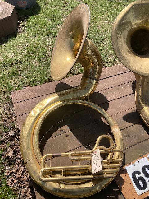 Two 1900s Solid Brass Estate Sousaphone: Two 1900s solid brass estate Sousaphone. Dented and in need of work. Sold in as is condition, missing some parts. No name apparent. Please read the Terms and Conditions of this auction thoroughly for 