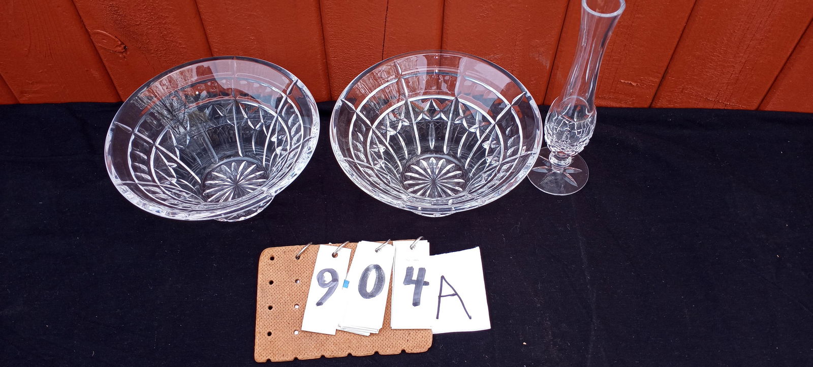 Three Signed Waterford Cut Crystal Pieces: Three signed Waterford cut crystal pieces. Two matching serving bowls (8.25"w x 4"h). One rose bud vase (2.75"w x 9.25"h). All an excellent condition. Please read the Terms and Conditions of this auct
