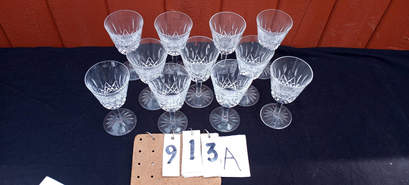 11 Signed Waterford Cut Crystal Wine Glasses: 11 signed Waterford cut crystal wine glasses. 3"w x 5.875"h. All in excellent condition. Please read the Terms and Conditions of this auction thoroughly for IMPORTANT bidder information.