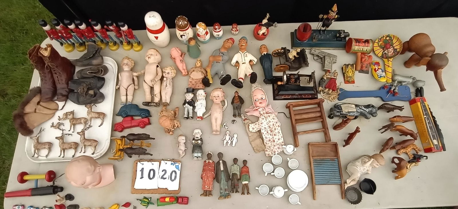 Nice Estate Doll and Toy Collection: Nice estate doll and toy collection. 19th century folk art hand carved and hand painted set of four American African-American family members (slaves?). #3 Germany large bisque 19th Century boy doll he