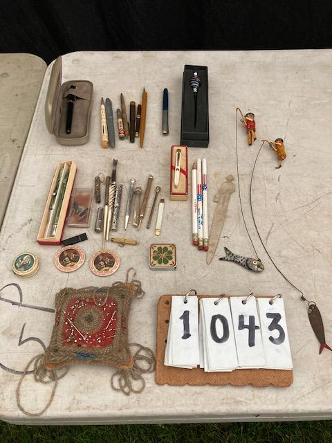 35 Antique Pens, Pencils, Mirrors and More: 35 antique pens, pencils, mirrors and more. One sterling overlay Ideal #452 half fountain pen. One early 1890s sterling and mother of pearl ink pen. One sterling silver pencil. One gold plated pencil.