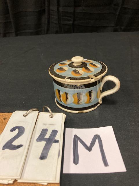 Cat's Eye Mocha China Covered Mustard Pot: Cat's Eye Mocha China Covered Mustard Pot. 3"h. x 4-1/4" diam. Condition: Base is good with chips, lid has a break repair. Spatterware and Mocha China cataloged by Jeff Dehart of Conestoga Auction Com