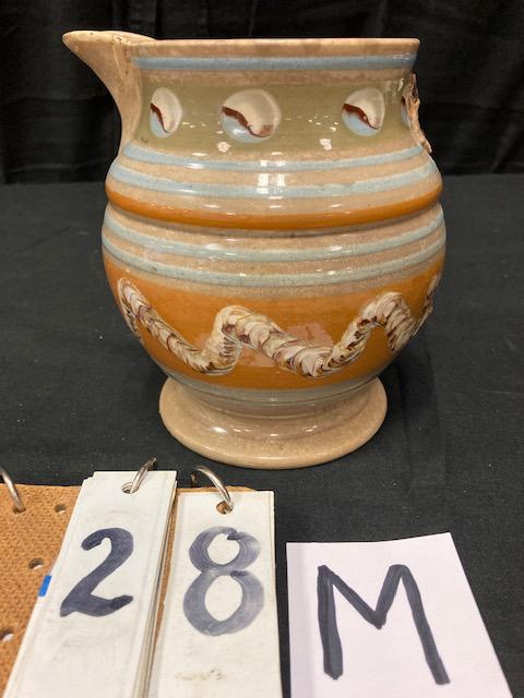 Cat's Eye and Earthworm Mocha China Pitcher: Cat's Eye and Earthworm Mocha China Pitcher. 6-1/4"h. Condition: Poor with stains, chips and missing handle. Spatterware and Mocha China cataloged by Jeff Dehart of Conestoga Auction Company, Manheim,