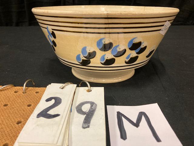 Cat's Eye Mocha China Mixing Bowl: Cat's Eye Mocha China Mixing Bowl. 4-1/4"h. x 8-1/2" diam. Condition: Fair with several lines and wear. Spatterware and Mocha China cataloged by Jeff Dehart of Conestoga Auction Company, Manheim, Pa.