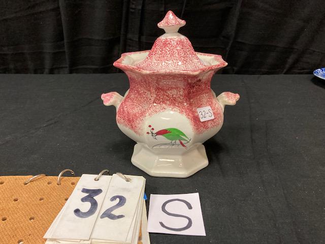 Red Spatter China Parrot Pattern Covered Sugar Bowl: Red Spatter Ironstone China Parrot Pattern Covered Sugar Bowl. 8"h. Condition: Good with two chip repairs on rim. Spatterware and Mocha China cataloged by Jeff Dehart of Conestoga Auction Company, Man