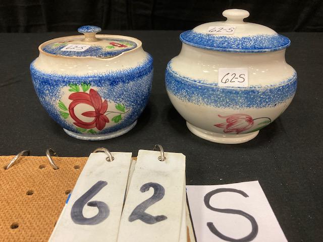 Two Blue Spatter China Floral Pattern Sugar Bowls: Two Blue Spatter China Floral Pattern Covered Sugar Bowls. Memorial tulip pattern, 4-1/2"h. and Adams Rose pattern, 4"h. Condition: Good with chips and repairs. Spatterware and Mocha China cataloged b