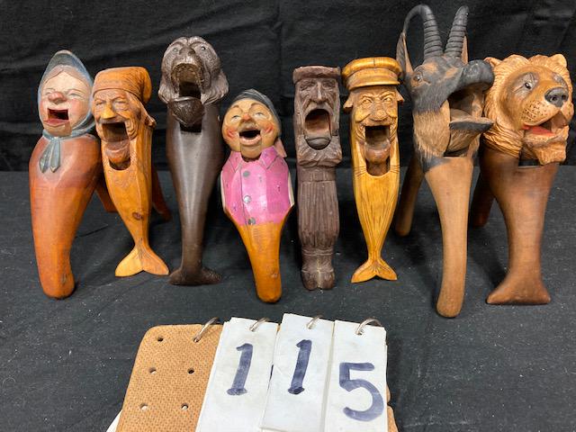 Eight Black Forest 19c Hand Carved Nutcrackers: Eight exceptional Black Forest 19th century hand carved nutcrackers and one nutcracker book. One monkey with glass eyes. 8.25"l x 2.25"w. One lion with glass eyes. 8"l x 2.5"w. One mountain goat or ra