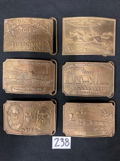 Six Solid Brass Tiffany Studio Reproduction Belt Buckles: Six solid brass Tiffany Studio reproduction usable belt buckles. Tiffany & Co, NYC. Believed to be reproductions from the mid-1970s. Can be fitted to leather for a nice belt. One Wells Fargo & Co. oce
