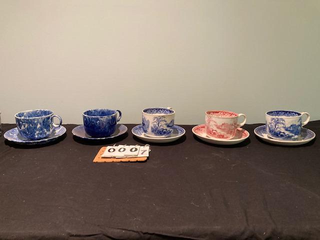 Five 1830s Flow Blue and Transferware Cups and Saucers: Five 1830s sets of flow blue and transferware cups and saucers. Two pairs of blue and white transferware cups and saucers and one red and white pair. Some signed Lorraine Adams. Two blue and white spo