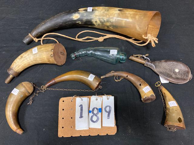 Eight 19c Antique Powder Flasks: Eight 19th century antique powder flasks. One rare 1800s hand blown glass powder horn and others. See photos. From the Hinkle Estate of Truxton, NY. Please read the Terms and Conditions of this auctio