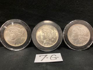 One Morgan and Two Peace Silver Dollars: One Morgan and two Peace silver dollars. 1904-O Morgan. 1922-P and 1923-P Peace. All coins in mint condition with excellent original luster. Please read the Terms and Conditions of this auction thorou