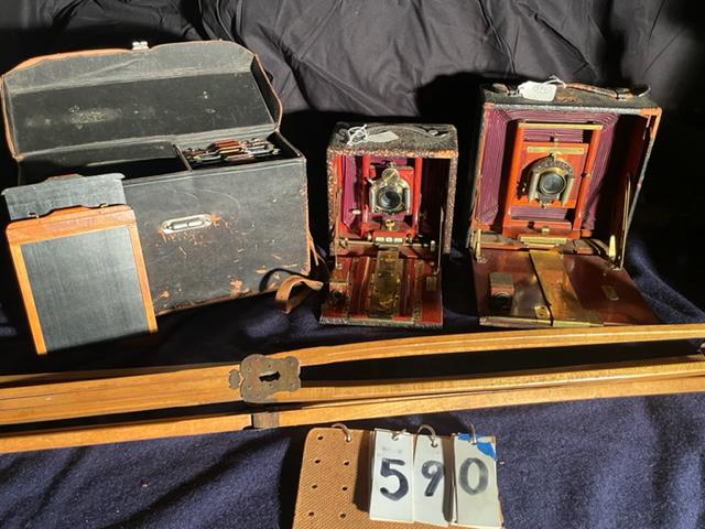 Two Antique Cameras and One Tripod: Two antique cameras and one tripod. One R.O. & C. Co. Pony Primo #5 Bausch & Lomb camera, 8.5"w x 11"d x 8.75"h. One Seneca Autic, Patent July 23rd, 1901. One tripod. Unsure if cameras work. From the 