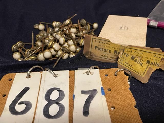 77 H.L. Judd NY Porcelain Frame Nails: 77 H.L. Judd & Co. NY porcelain Victorian picture frame or curtain nails. This is a rare old hardware store find. Most of the time you will only find a small handful but we have hundreds in unused, ne