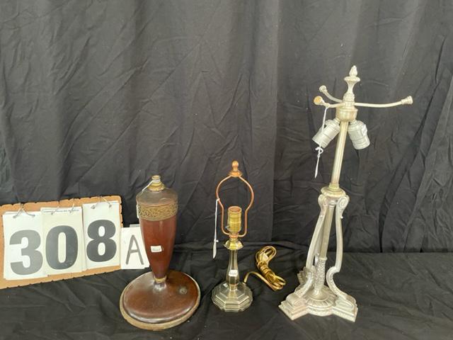 Three 1900s Signed Pairpoint Lamp Bases: Three 1900s signed Pairpoint lamp bases. One wood base with no sockets, 7.25"w x 13.5"h. One silverplate base, 7.75"w x 22.25"h. One boudoir base, 4"w x 14.25"h. Please read the Terms and Conditions o