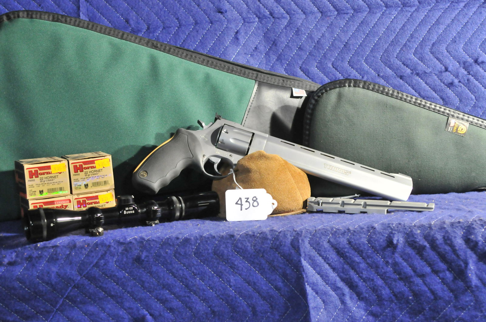 Taurus Raging Hornet Model 2265: Taurus Raging Hornet Model 2265. 22 Hornet. 10" stainless steel barrel. Eight shot. With a scope mount and Burris scope (rings present but incomplete). Comes with two green zippered cases and ammo (2