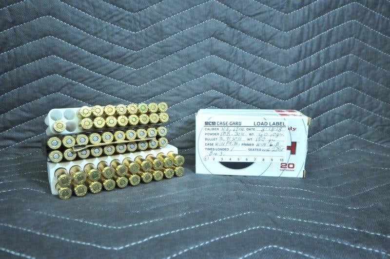 308 Winchester Ammo: 308 Winchester ammunition. Two full boxes of reloads and 67 rounds of mixed headstamp factory loads. See photos.