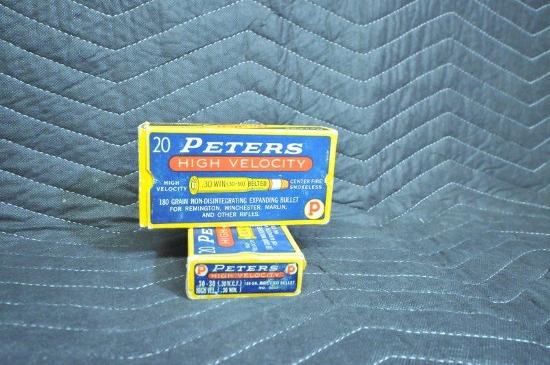 30-30 Winchester Ammo: 30-30 Winchester ammunition. Two antique boxes of Peters, 30 rounds. See photos.