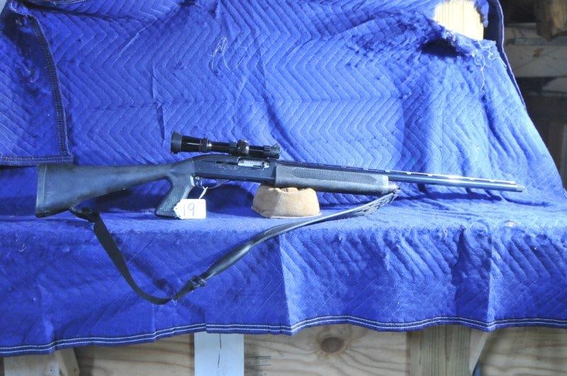 Remington 1100: Remington 1100 with Leupold 1.5x5 scope. Pachmayr Rollover mount. Choate pistol grip stock and forend. 25" vent rib barrel with screw in choke. Serial No. M164163V.