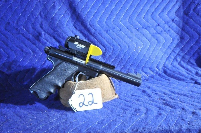 Ruger Mark II Target: Ruger Mark II Target. 22LR. 5.5" heavy barrel. Has Sig red dot. Custom trigger. Hogue grips. Serial No. 226-01176.