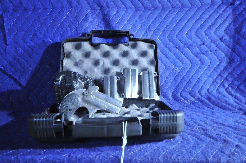 Bond Arms Defender: Bond Arms Defender. 3" barrels. 45 Colt, 2.5" 410. 357 Magnum, 38 Special. 45ACP, 22LR. With holster. Serial No. 143471.