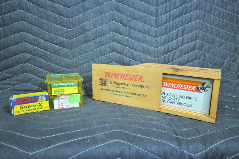 Assorted 22LR Ammo: Assorted 22LR ammunition. 175 rounds Remington, 48 rounds in antique Super X box. Custom Winchester wooden case with 400 rounds. See photos.