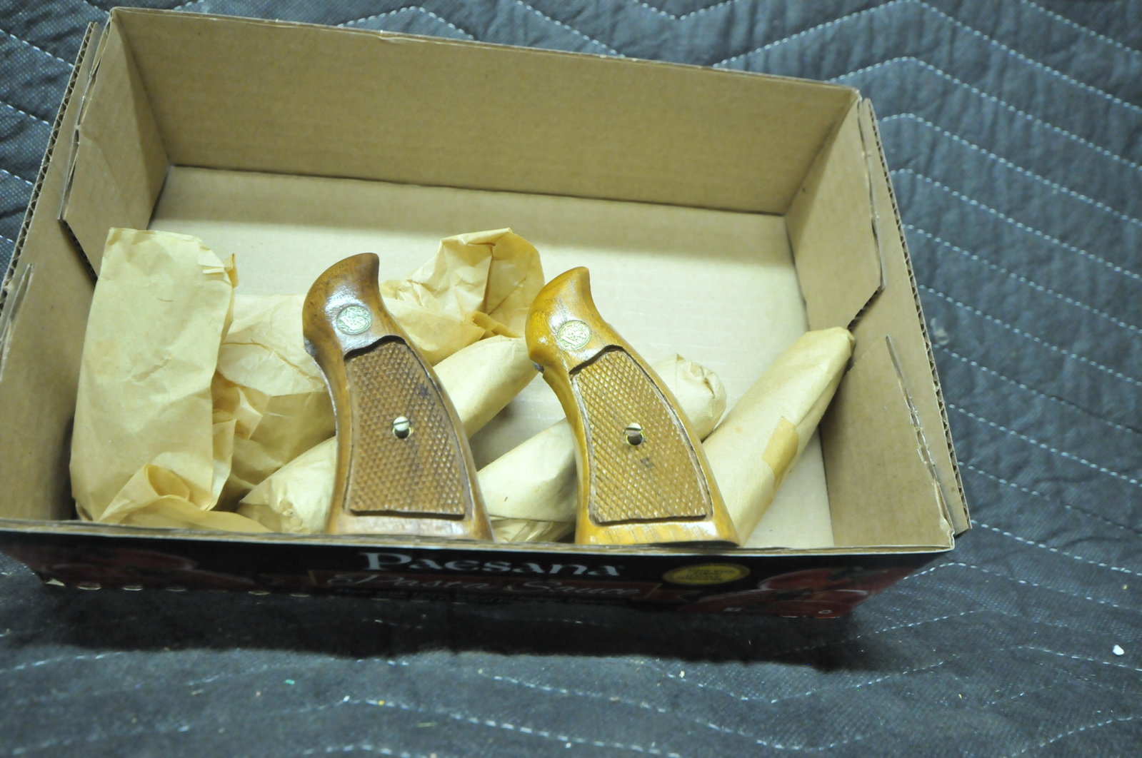 Six Sets of NIB Smith & Wesson Walnut Service Grips: Six sets of NIB Smith & Wesson walnut service grips. See photos.