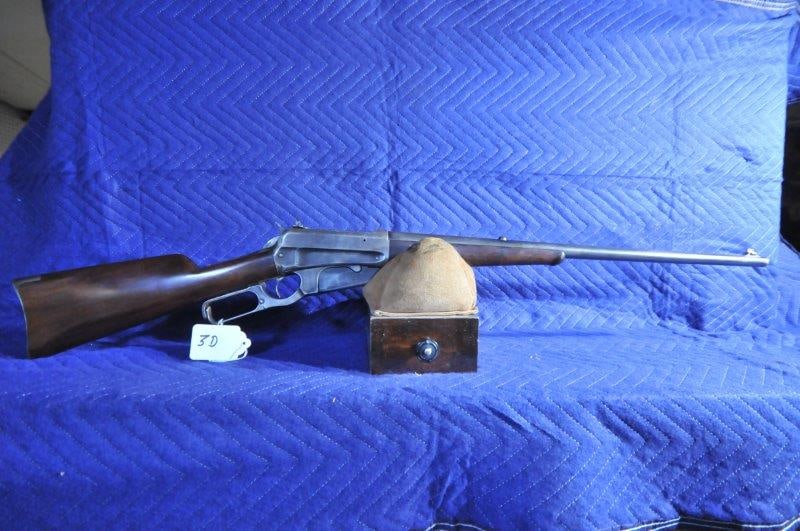 Winchester Model 1895: Winchester Model 1895 lever action rifle. 30 US Government (30-40 Krag). 24" barrel. Lyman No. 38 peep sight attached to the receiver. Wear on the metal surfaces. A few blemishes on the wood stock. Ov