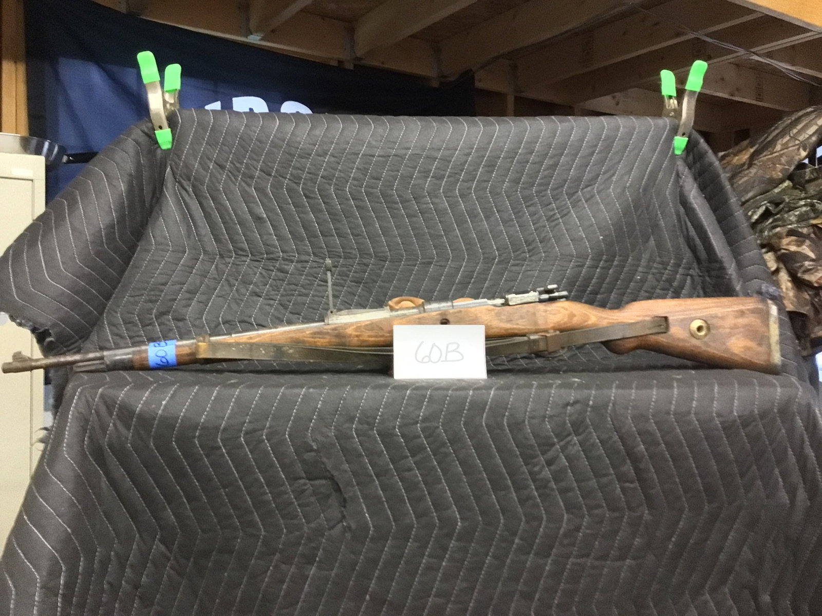 1944 German Mauser Model 98: 1944 German Mauser Model 98. 8mm - large ring. German proof marks. 24.5" barrel. With leather strap. Serial No. 9061. 80% SN matching.