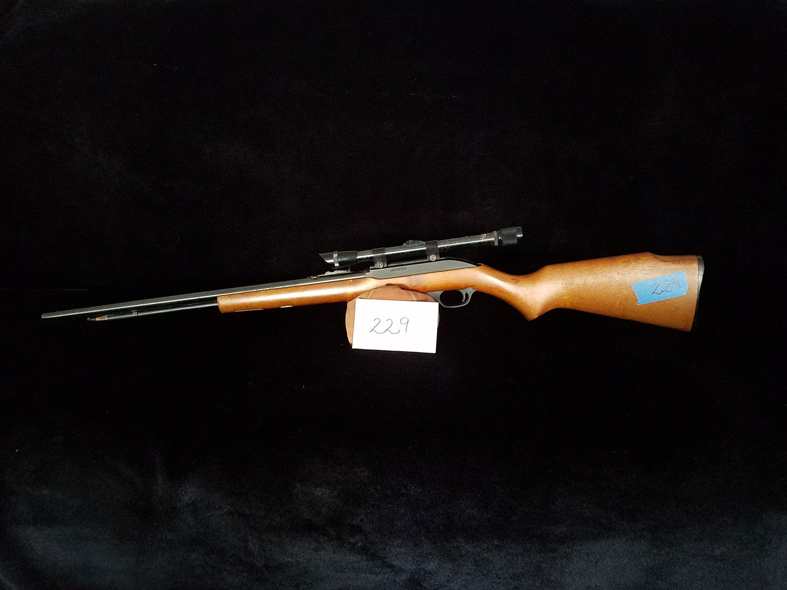 Marlin Model 60: Marlin Model 60. 22L only. 22" barrel. Minor wear marks on stock, metal in good condition. Apache scope. Serial No. 06160169.