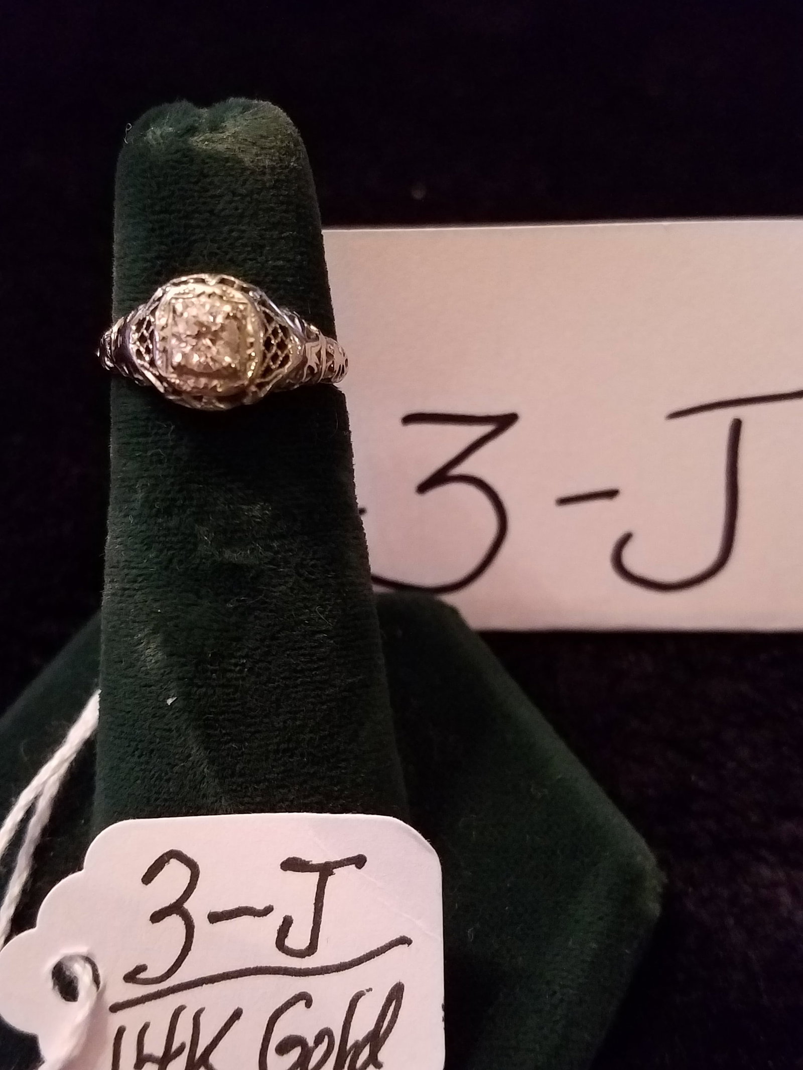 Ladies 14K Gold and Diamond Engagement Ring: Ladies 14K gold and diamond engagement ring with fancy setting. Approx. size 4.0. 1.3 dwt total weight including stone. See photos. From the Potsdam, NY Estate. Please read the Terms and Conditions of