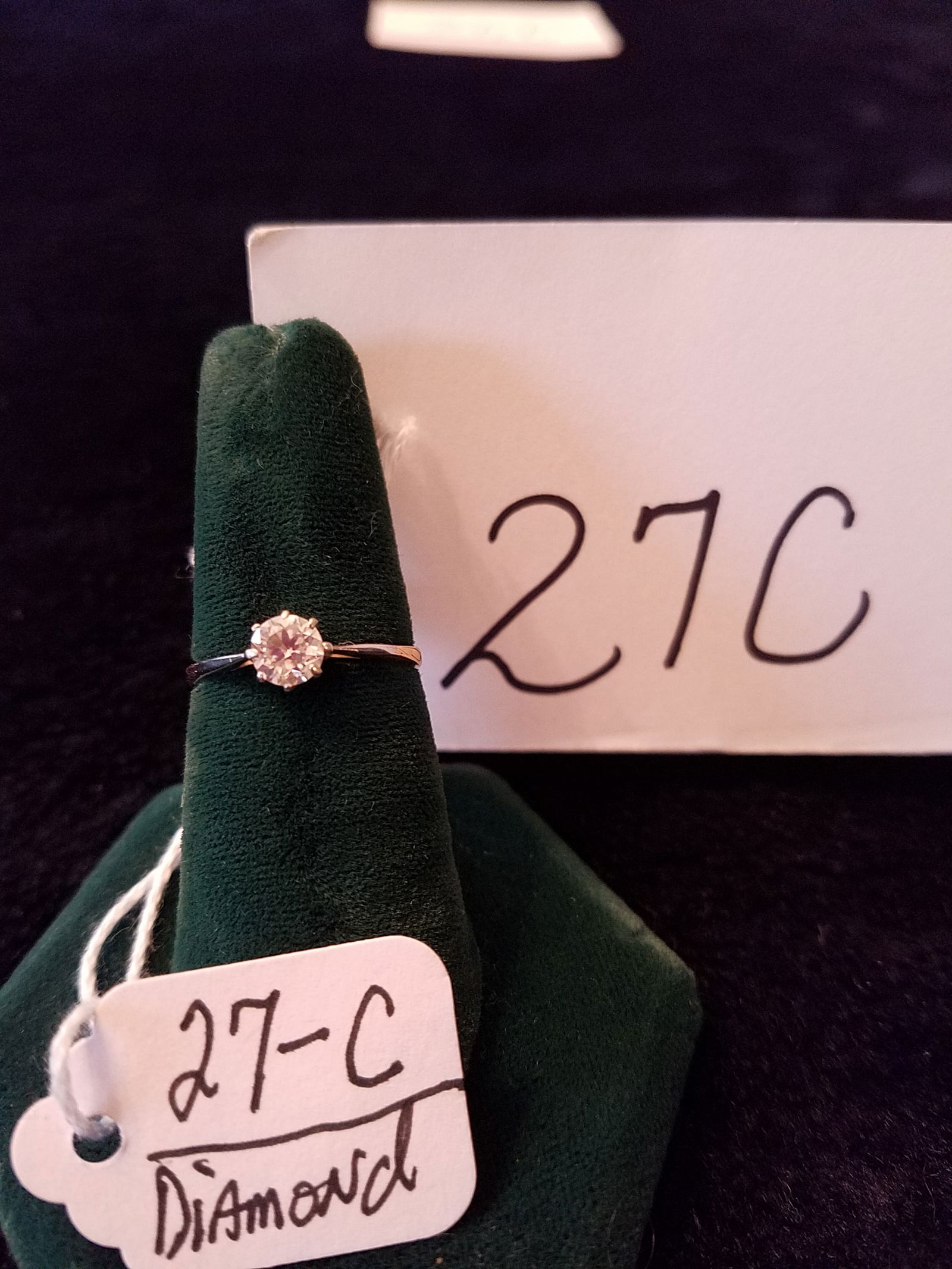 Ladies 14K Gold and Diamond Ring: Ladies 14K gold and diamond ring in a Tiffany setting. Approx. size 6.5. 0.9 dwt total weight including stone. Please read the Terms and Conditions of this auction thoroughly for IMPORTANT bidder info