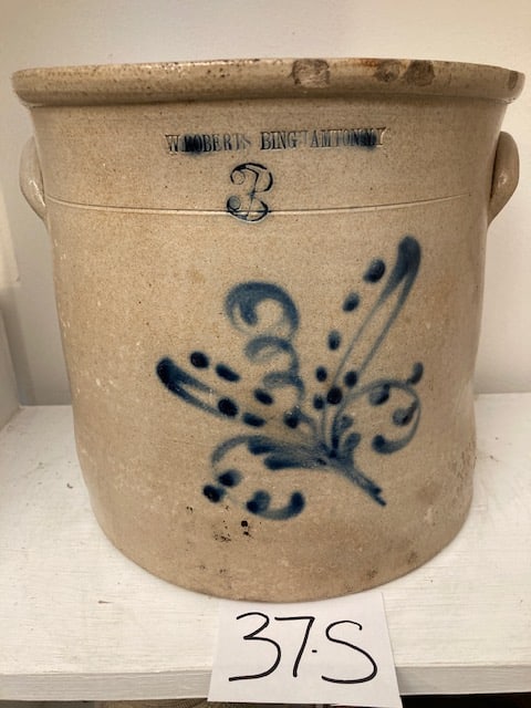 W. Roberts Three Gallon Crock: W. Roberts, Binghamton, NY, three gallon crock with flower. Has salt chips, rim chips and cracks. 10"w x 10.25"h. Please read the Terms and Conditions of this auction thoroughly for IMPORTANT bidder i