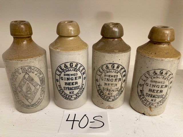 Four Ginger Beer Bottles: Four ginger beer bottles. Three Lee & Green English brewed ginger beer bottles, Syracuse, NY (Skegness, Bourne, Sleaford & Spalding). One Salt City Bottlery Co. bottle, Syracuse, NY (cracked). Please 