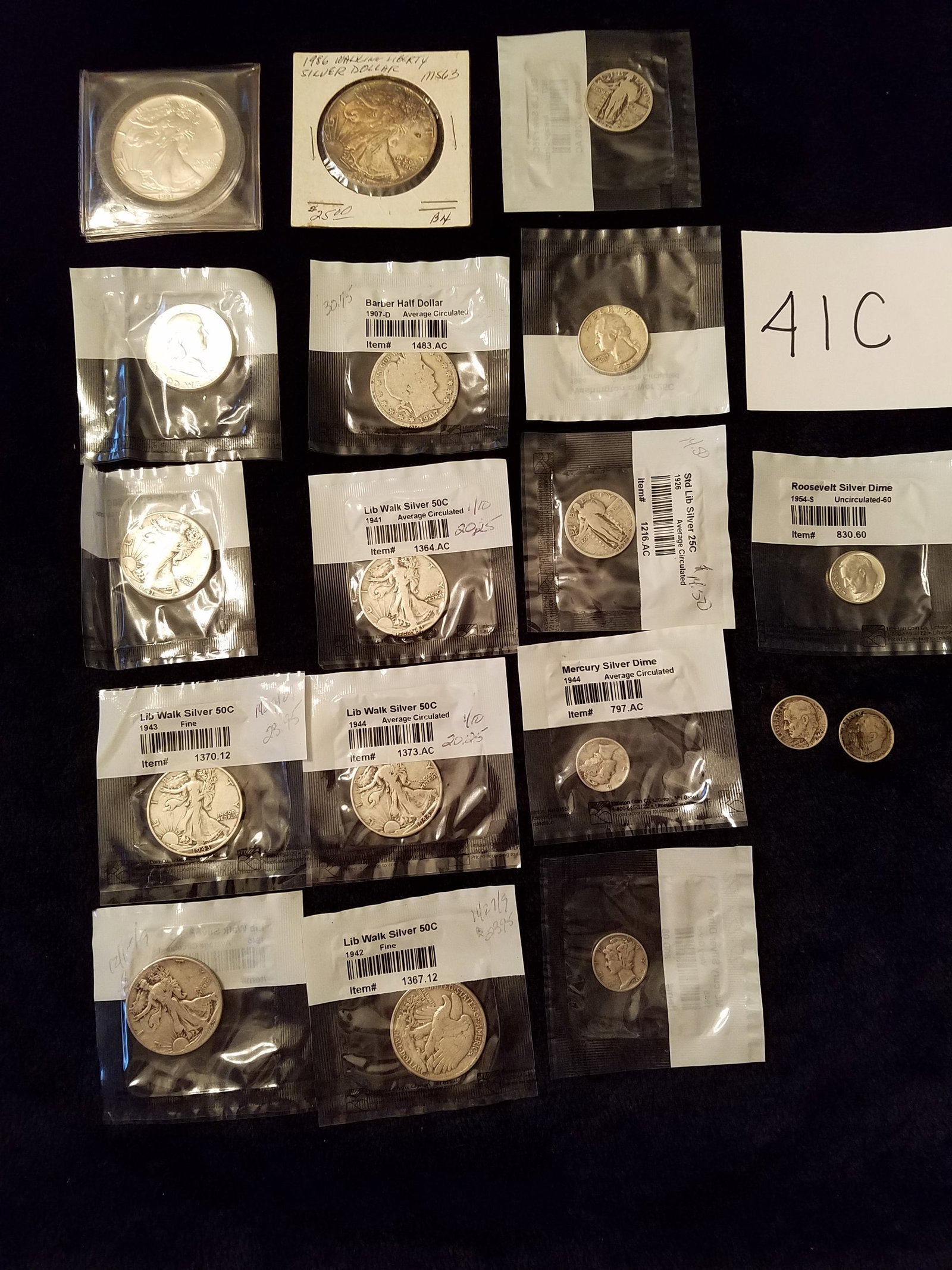 US Silver Coin Collection: US silver coin collection. Two $1 Liberty coins, .999 silver, 1986 and 1991. One 1963 Ben Franklin half dollar. Two 1941 Walking Liberty half dollars. Three Liberty half dollars, 1943, 1944 and 1945. 