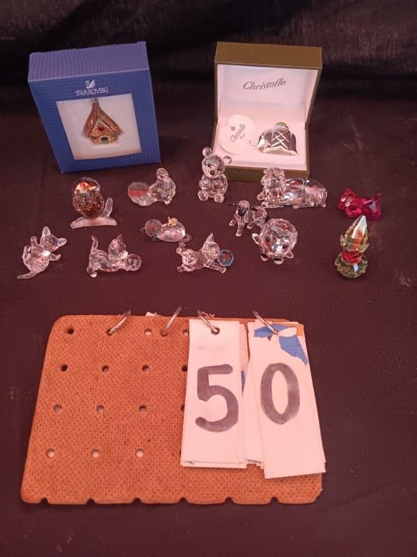 13 Swarovski Cut Glass Figurines 1- Christofle Paris Boxed Figurine: 14 Items: 5 cats with glass balls, 1 cat with mouse, 1 sheep, 1 bear, 2 owls, 1 clown?, 1 bird, and boxed house Christmas ornament. All in excellent condition as far as we have inspected. 14 items for
