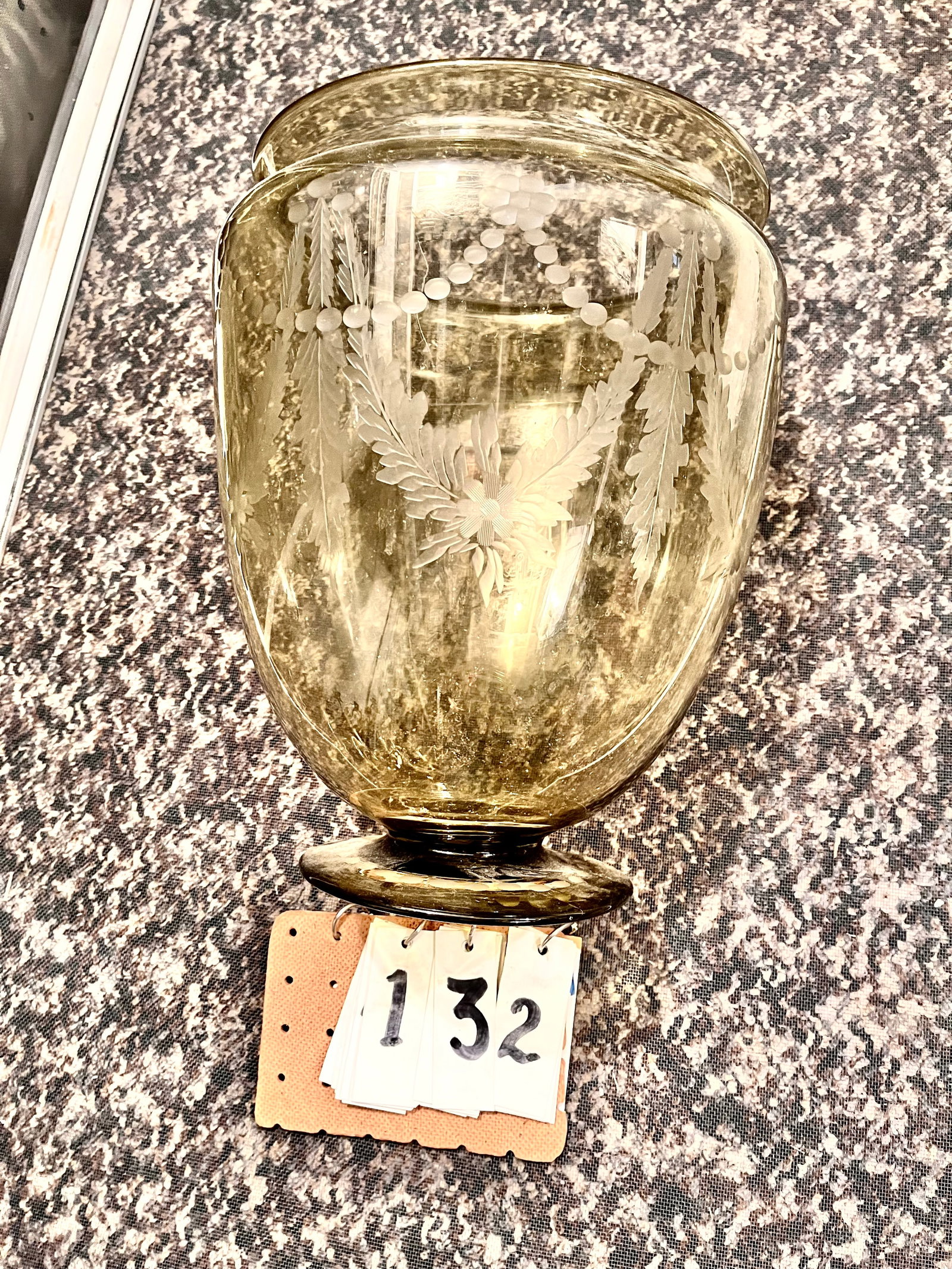 1900s Light Green Vase: 1900s hand blown light green floral and leaf etched vase with a ground pontil. Possibly Steuben. Top 9.5"dia, body 10.25"dia, base 6.5"dia. From the Rochester, NY Estate.