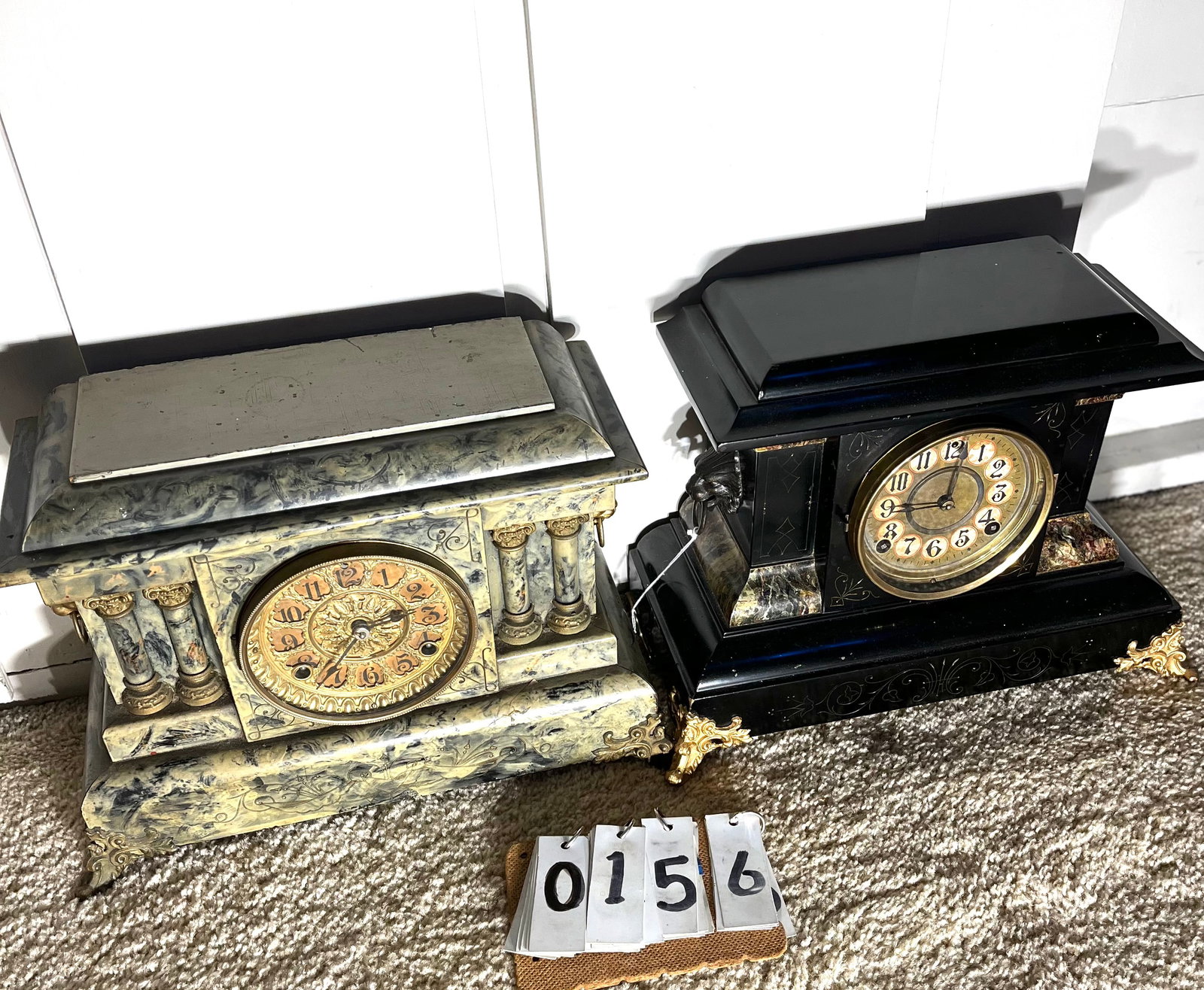 Two Antique Mantle Clocks: Two antique mantel clocks with time and strike. One Seth Thomas faux marble clock with key and pendulum. One faux marble clock made by The Ferrin Bros., New Haven, CT. From the Rochester, NY Estate.