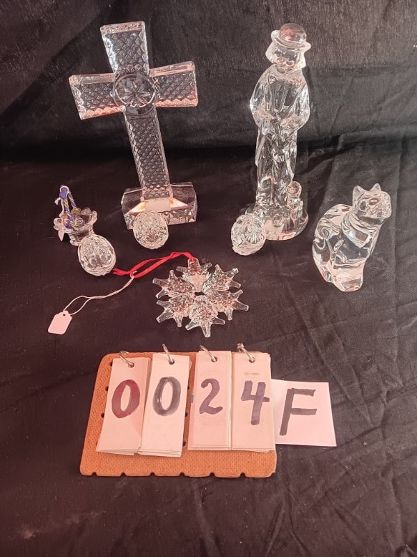 9 Signed Estate Waterford Crystal Glass Pieces: Snowflake Christmas ornament w/ box and paperwork, clown with dog, cross, cat looking up, basket with painted egg, rocking horse boxed Christmas ornament, 3 covered eggs. No measurements for this lot,