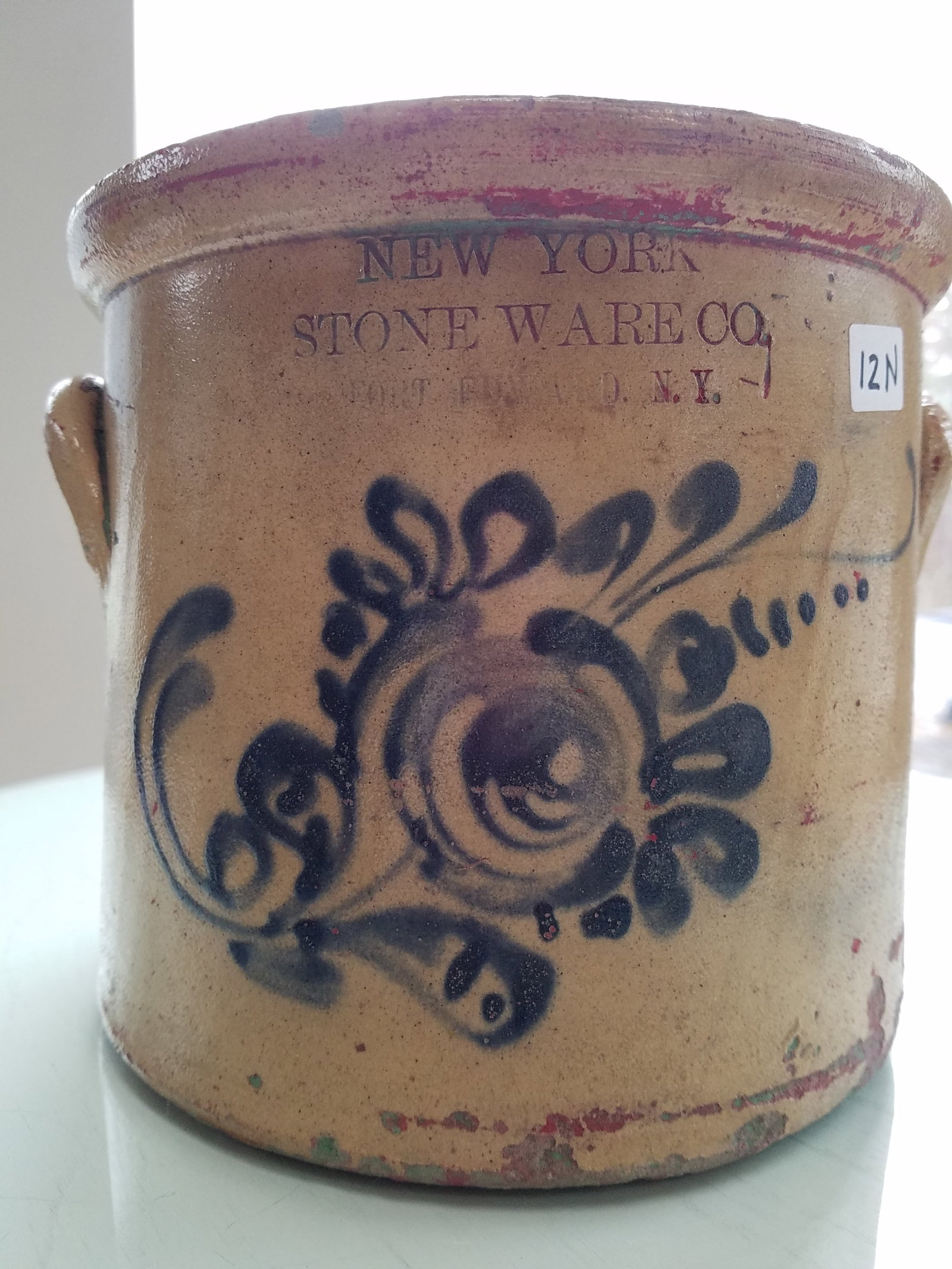 New York Stoneware Co. Fort Edward, N.Y. Crock: New York Stoneware Co. Fort Edward, N.Y. crock. Has crack and dried paint (can be cleaned off). 9" dia. x 7.5"h. See photos. Please read the Terms and Conditions of this auction thoroughly for IMPORTA