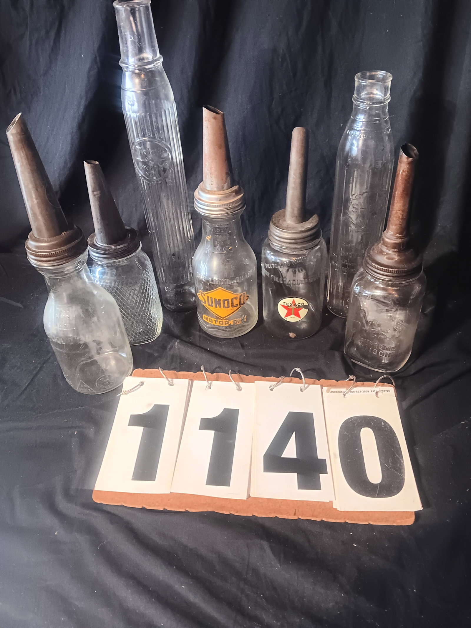 Seven Antique Glass Oil Bottles (1 of 4)