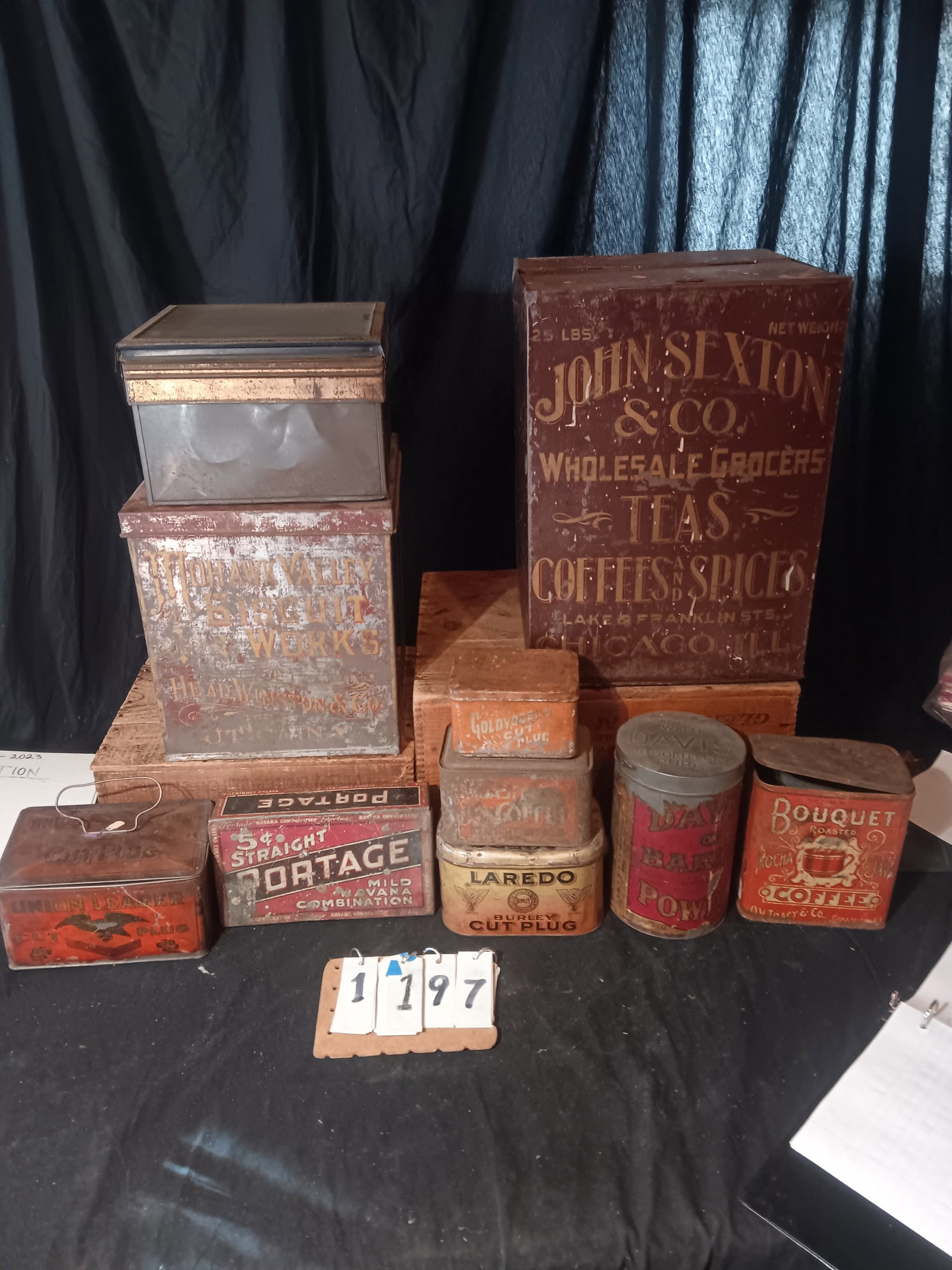 Ten Vintage Advertising Tins: Ten vintage advertising tins. Mohawk Valley Biscuit, Utica, NY. John Sexton Coffees & Spices, Chicago, Ill. Bouquet Coffee. Davis Baking Powder. Laredo Burley Cut Plug Tobacco. Goldvogels Cut Plug. Ro