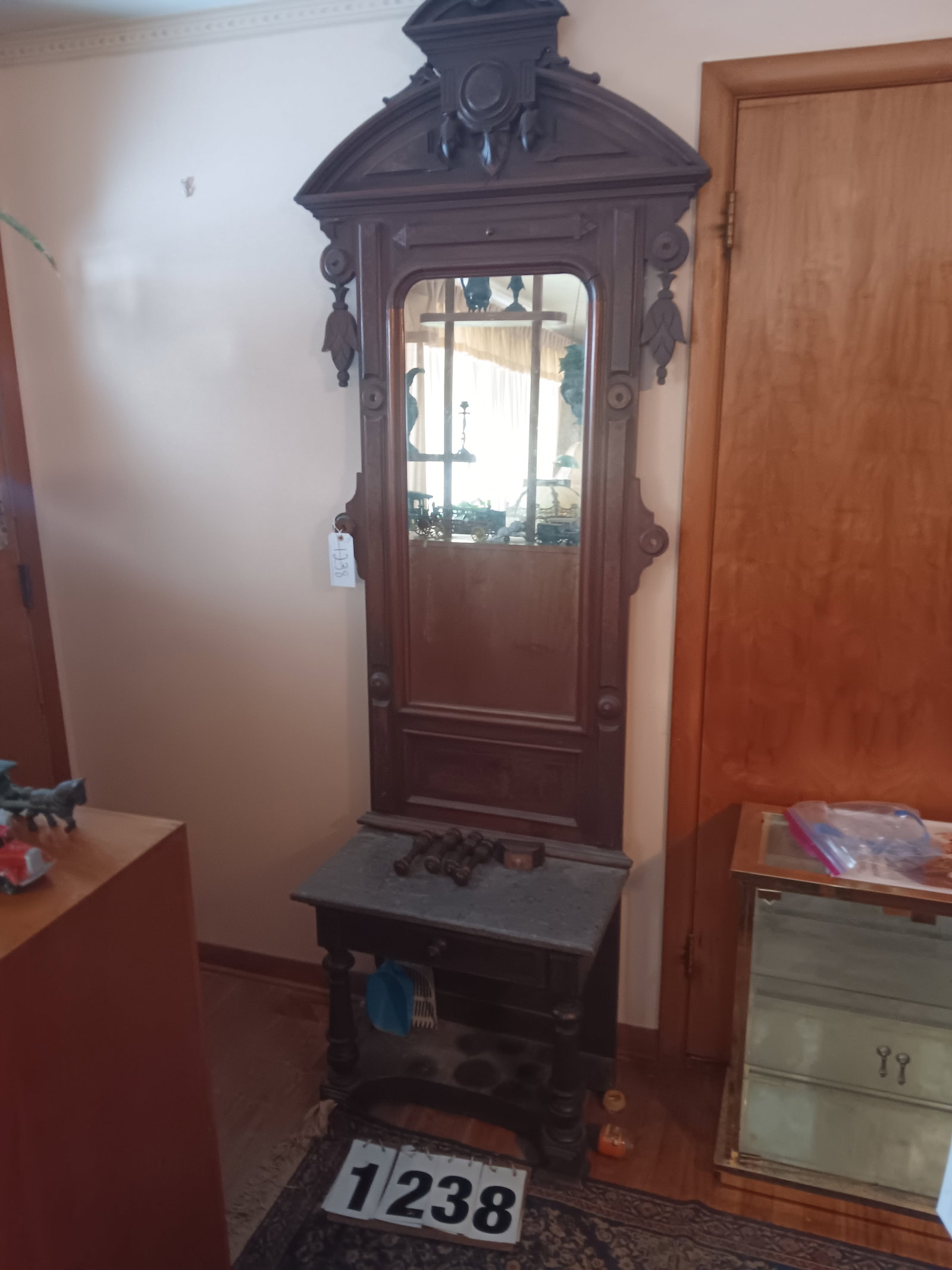 1870s Victorian Walnut Marble Top Hall Tree: 1870s Victorian walnut marble top hall tree. It is highly carved and has the original finish with one drawer. Missing two walnut hooks. 32"l x 13.5"w x 92.75"h. See photos. From the North Syracuse, NY