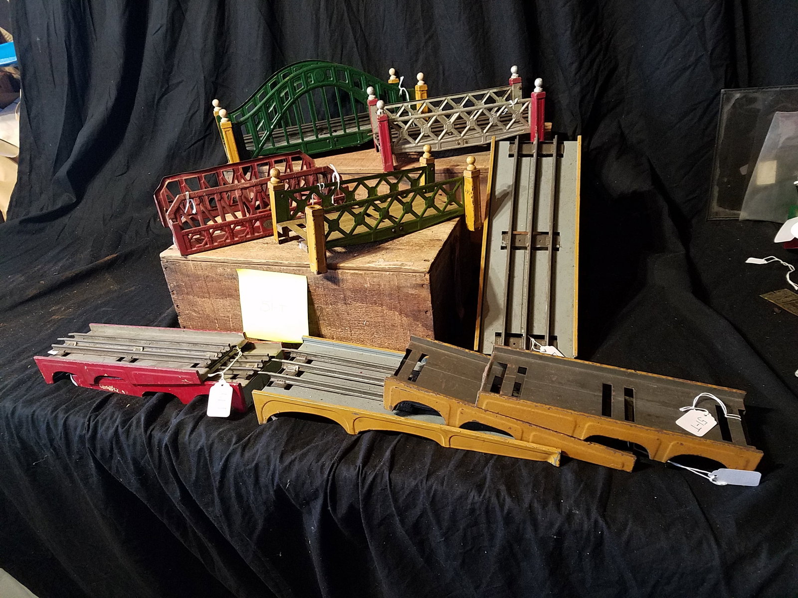 Ten Pieces of Train Track Accessories: Ten pieces of train track accessories. Bridges and ramps. Standard gauge and 0 gauge. See photos. From the North Syracuse, NY Estate. Please read the Terms and Conditions of this auction thoroughly fo
