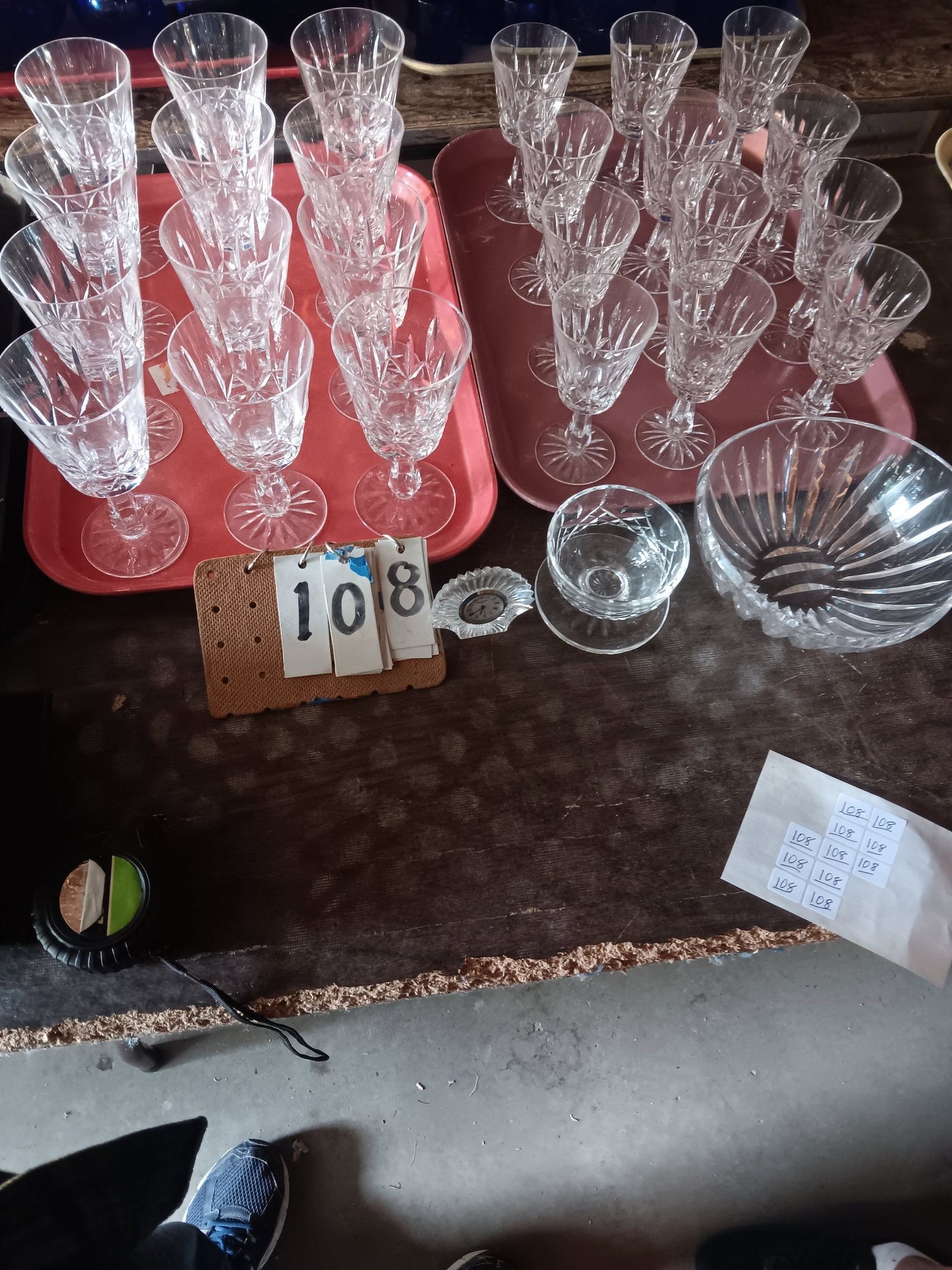 27 Pieces of Signed Waterford Items: 27 pieces of signed Waterford items. 12 wine glasses, 12 water glasses, one miniature boudoir clock, one cocktail sauce dish and one bowl. Please read the Terms and Conditions of this auction thorough
