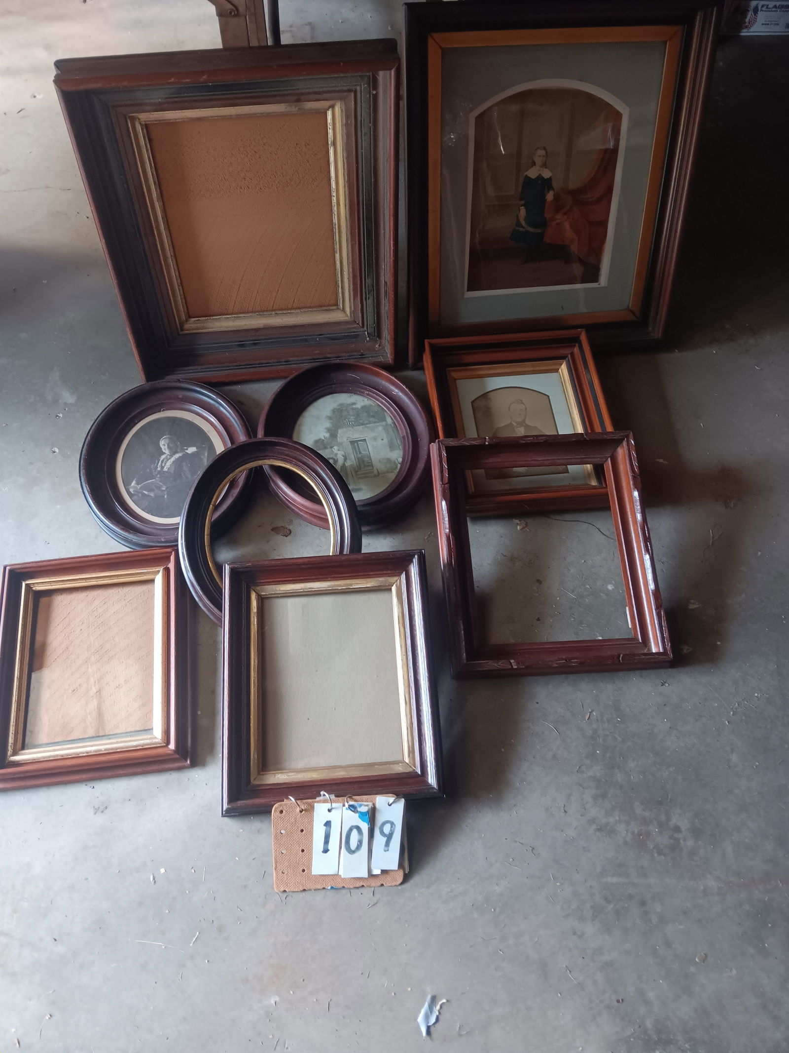 Nine American 1890s Solid Walnut Picture Frames: Nine excellent American 1890s solid walnut picture frames. Some have pictures. Please read the Terms and Conditions of this auction thoroughly for IMPORTANT bidder information.