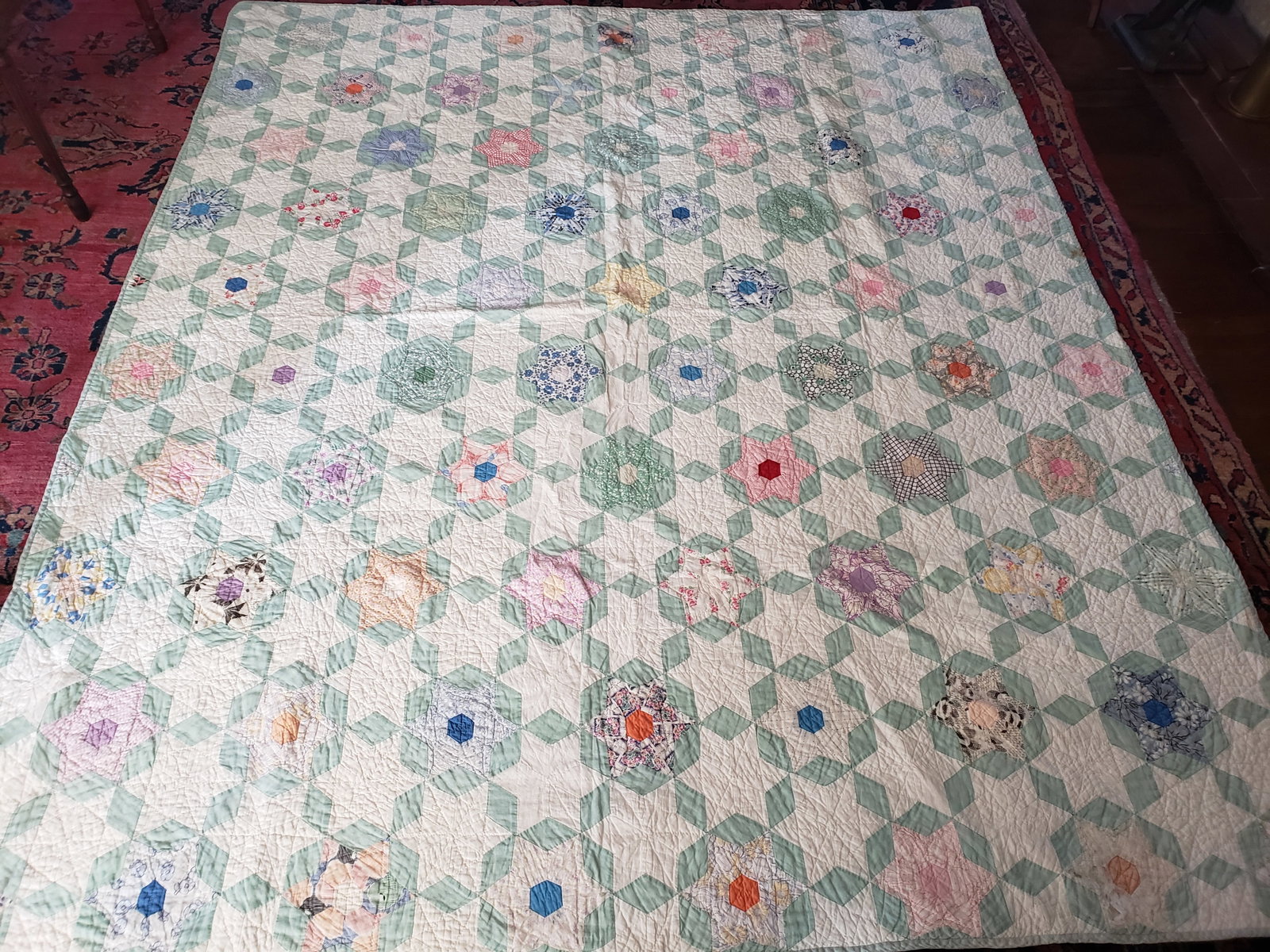 Star 19c Hand Tied American Quilt: Star 19th century hand tied American quilt. One damaged panel, see photos. 84"l x 72"w. Please read the Terms and Conditions of this auction thoroughly for IMPORTANT bidder information.