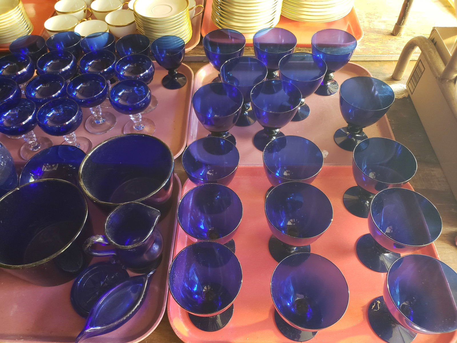 154 Piece Collection of Cobalt Blue Glassware: 154 piece collection of cobalt blue glassware. Collected over a lifetime. Wine glasses, water glasses, juice glasses, shrimp cocktail bowls, water pitchers, vases, dinner plates and much, much more. S