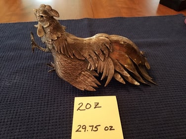 UPDATE: Silver Colored Bird Sculpture